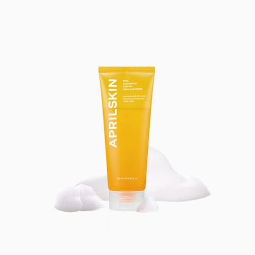 Lip & cheek blurring product in 06 Lofty with applicator wand on plain white background