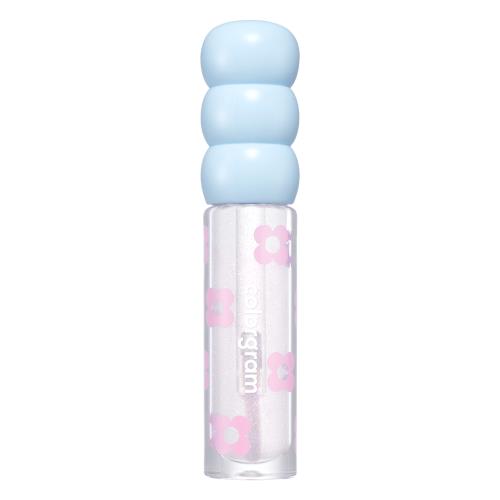 Long-lasting lip tint in 09 RED BOMB with applicator wand on plain white background