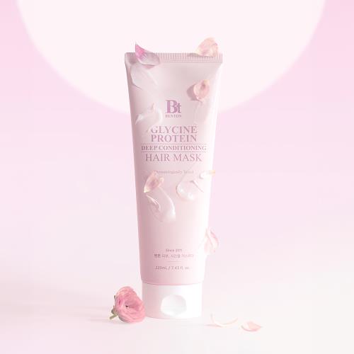 Transparent glass bottle with a silver pump, PLUM Peptide Booster Serum 50ml for rejuvenating skin care.