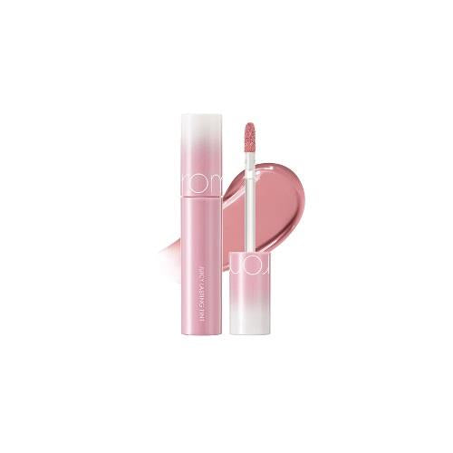 Lip balm in 06 Kaya Fig with applicator wand on plain white background