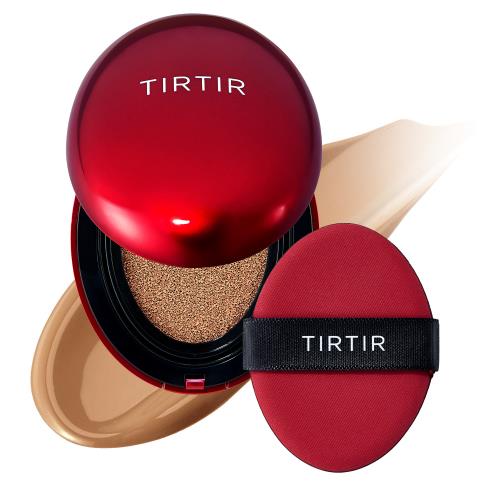 Round compact in soft pink with a mirrored lid, featuring Cheeky Stamp 01 Coy Cushion Blush in a vibrant coral hue.
