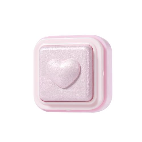 Long-lasting lip gloss in 011 CHAI with applicator wand on plain white background