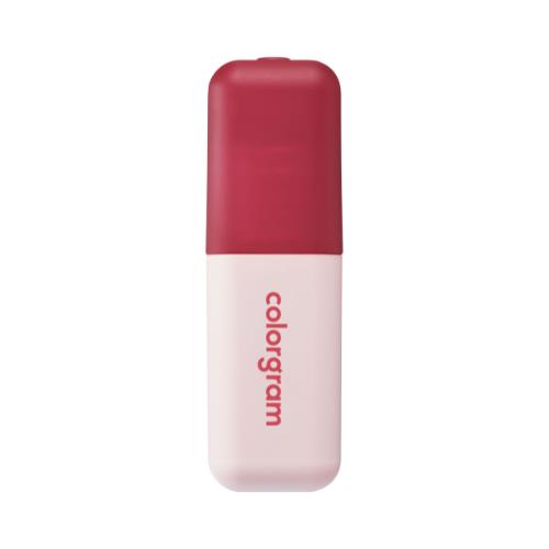 Long-lasting lip gloss in 222 F with applicator wand on plain white background