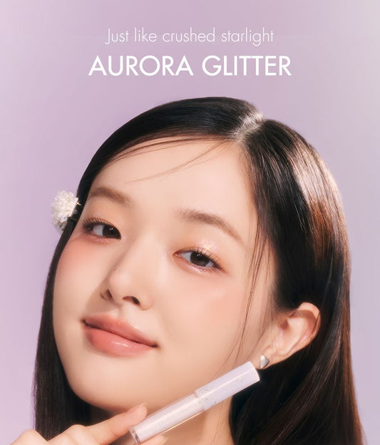 Lip balm in 02 Honey Chips with applicator wand on plain white background