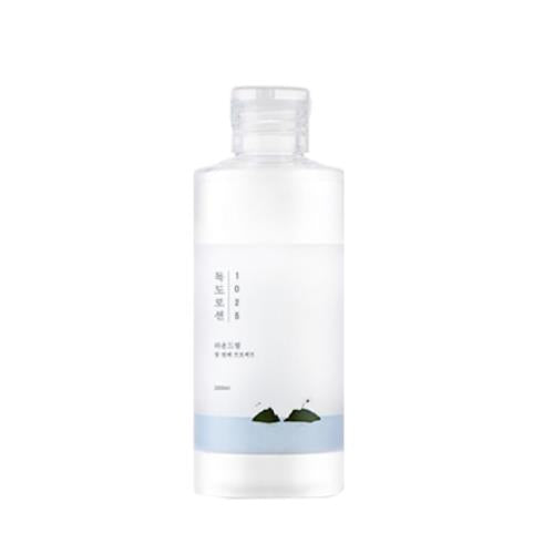 Korean toner in 210ml container in spray bottle on plain white background