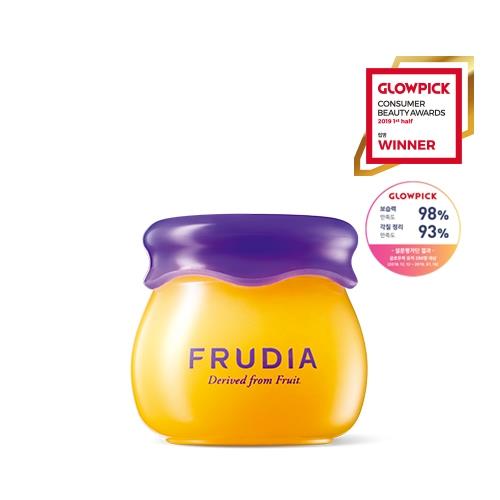 Moisturizing nourishing lip cream in 10g container with applicator wand on plain white background