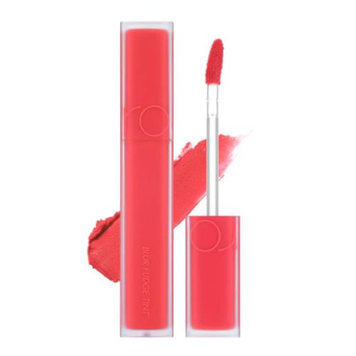 Lip gloss in 06 Deepen MOOR with applicator wand on plain white background