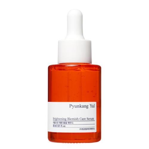 Concentrated brightening serum in 30ml container with dropper bottle on plain white background