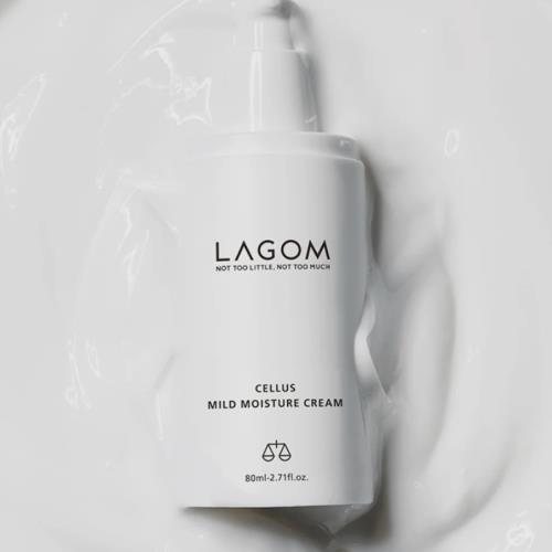 Two elegant glass bottles of Vegan Blackberry Complex Cream Essence Duo, featuring a sleek black design and pump dispensers.