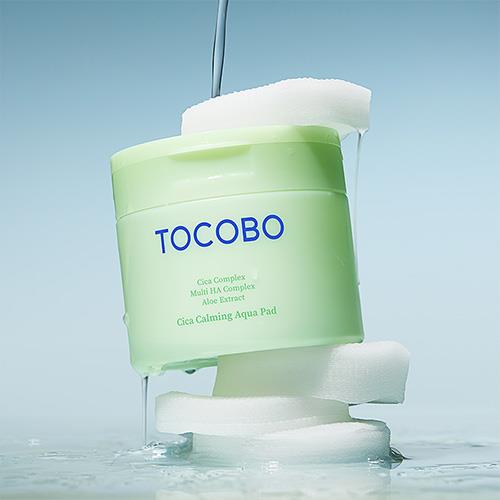 Soothing skin pad in 2 pads in container with tweezers on plain white background