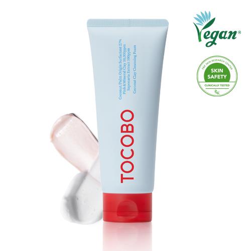 Gentle facial cleanser in 2ml container in pump dispenser on plain white background