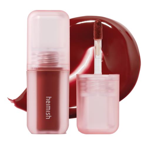 Lip balm in 15g container with applicator wand on plain white background