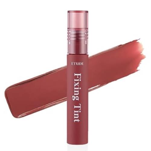 Lip gloss in 5ml container with applicator wand on plain white background