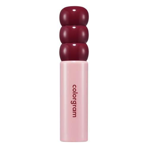Long-lasting lip tint in 04 Adorable Berry with applicator wand on plain white background