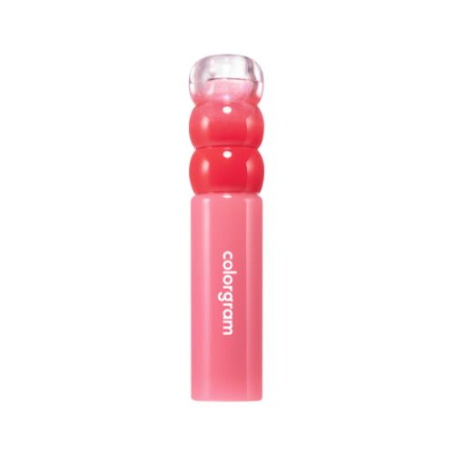 Long-lasting lip tint & gloss in 09 Heartful Mulberry with applicator wand on plain white background