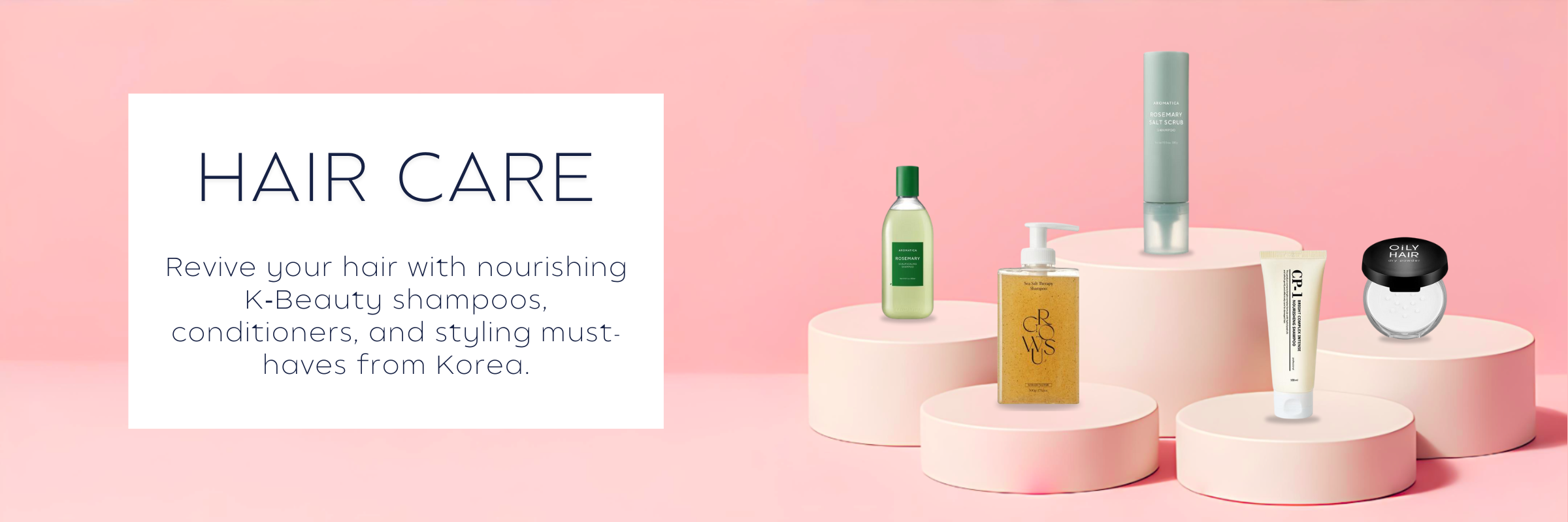 K‑Beauty haircare collection featuring shampoos, conditioners, and styling products on a minimal pink background