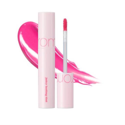 Long-lasting matte lip tint in 22 Grain NUDE with applicator wand on plain white background