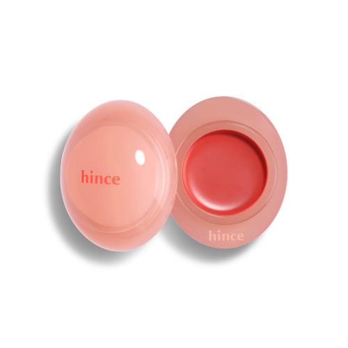Long-lasting hydrating lip tint in 09 Salmon Syrup in 4g container with applicator wand on plain white background