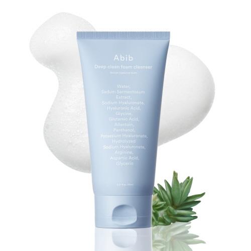 Lip balm & treatment in 16 Wine Stain in 15g container with applicator wand on plain white background