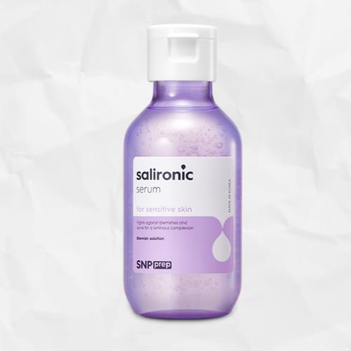 Concentrated brightening serum in 30ml container with dropper bottle on plain white background