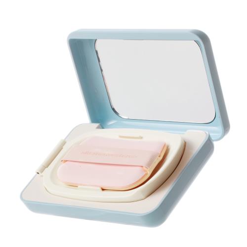Round glass jar of THE TRUE CREAM - MOISTURIZING BOMB in a soft blue hue with a silver twist-off lid, 50ml size.