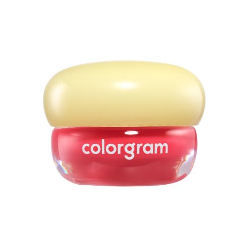 Long-lasting lip gloss in 04 Grapefruit JAM with applicator wand on plain white background