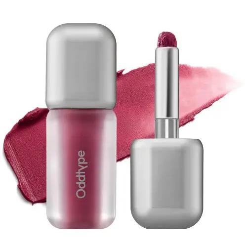 Frosted glass bottle with a silver pump top, showcasing Intensive Whitening Ampoule 50ml for brightening skin.