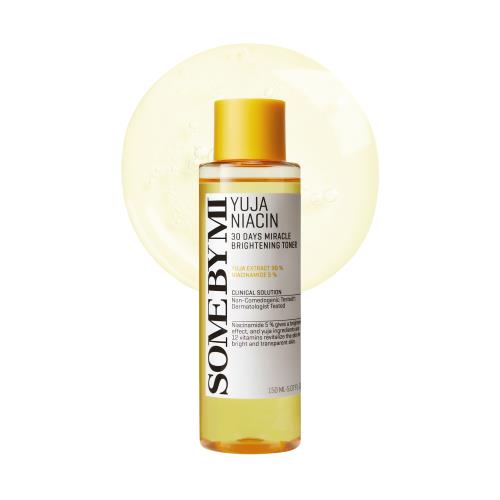 Brightening toner pad in 70 Pads in spray bottle on plain white background