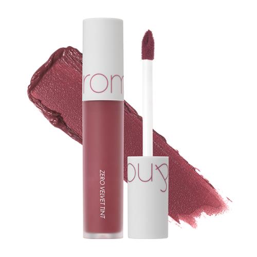 Long-lasting matte lip tint in 02 Joyful in 6ml container with applicator wand on plain white background