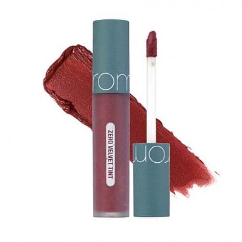 Long-lasting velvet lip tint in 04 Burnt Heart with applicator wand on plain white background